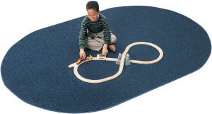 Solid Blueberry oval classroom rug from Carpets for Kids